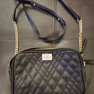 Small black cross body double pockets great condition & clean